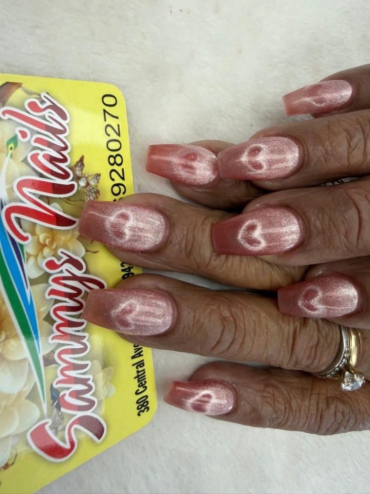 Pink cat eye coffin nails with heart accents — Sammy's Nails Holland MI