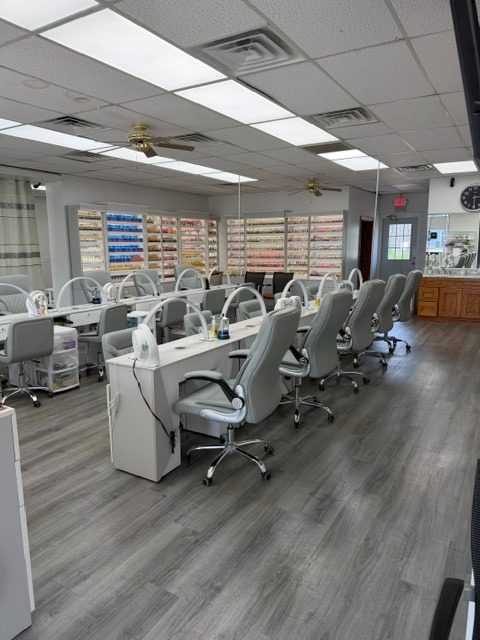 Manicure tables and color wall at Sammy's Nails Holland MI