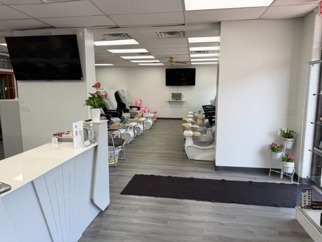 Inside Sammy's Nails — pedicure chairs and manicure tables Holland MI